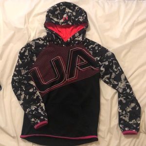 a Pink and black under armor sweatshirt